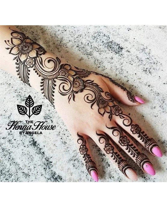 Sunflower Inspired Bold Back Hand Mehndi Design Sunflower Inspired Bold Back Hand Mehndi Design